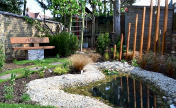 Sculpture And Pond